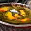 Bol de soupe curry-courge musquée