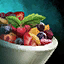 Bowl of Mists-Infused Fruit Salad with Mint Garnish